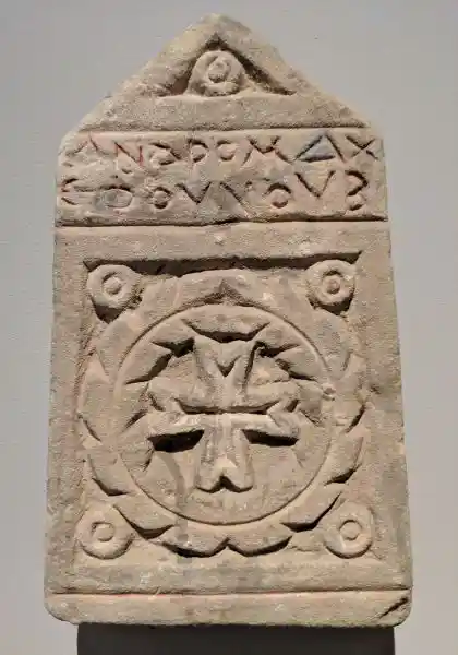 Gravestone of the Goldsmith Andromachos, cross in a wreath of leaves, located in Bode Museum